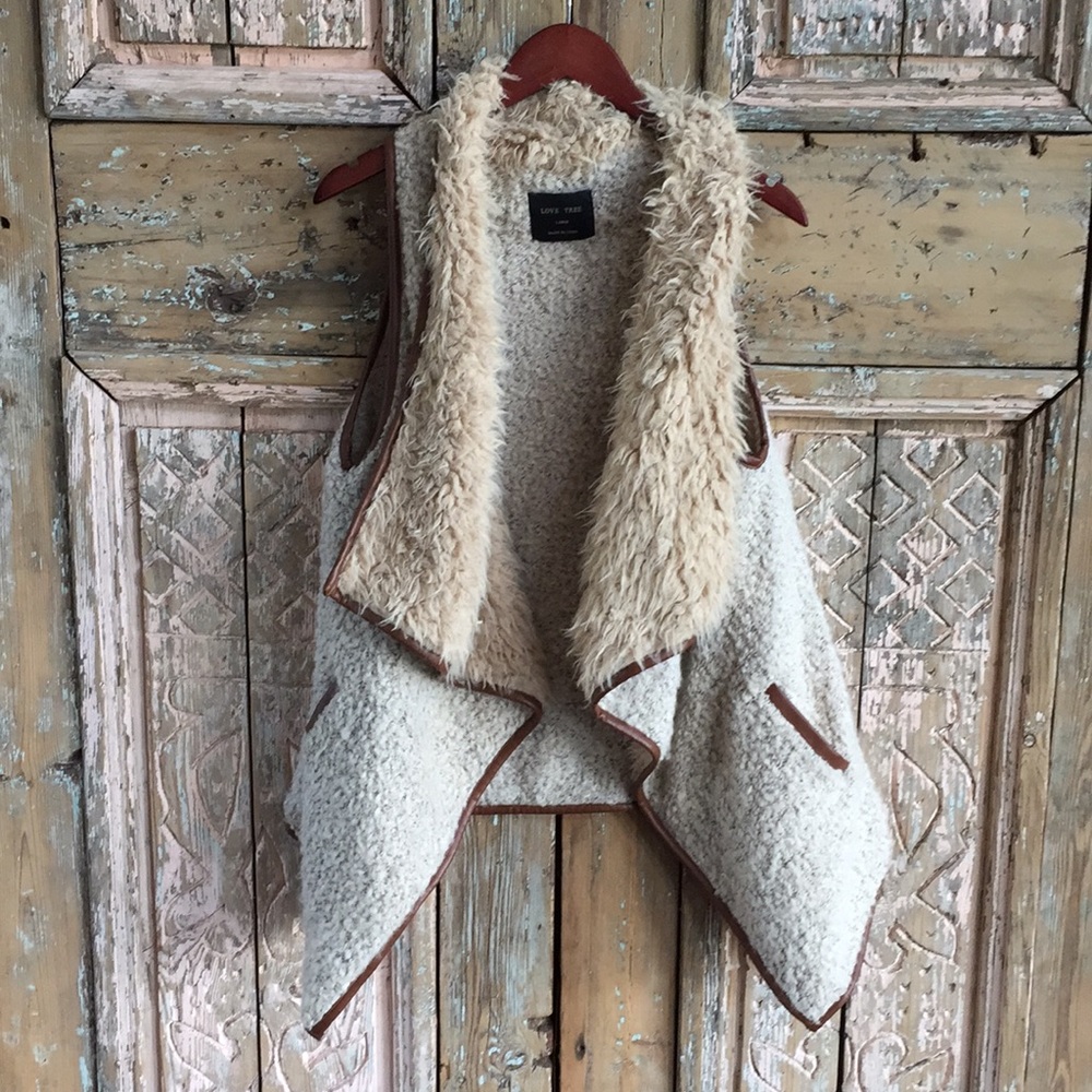 Faux fur vest with faux leather trim